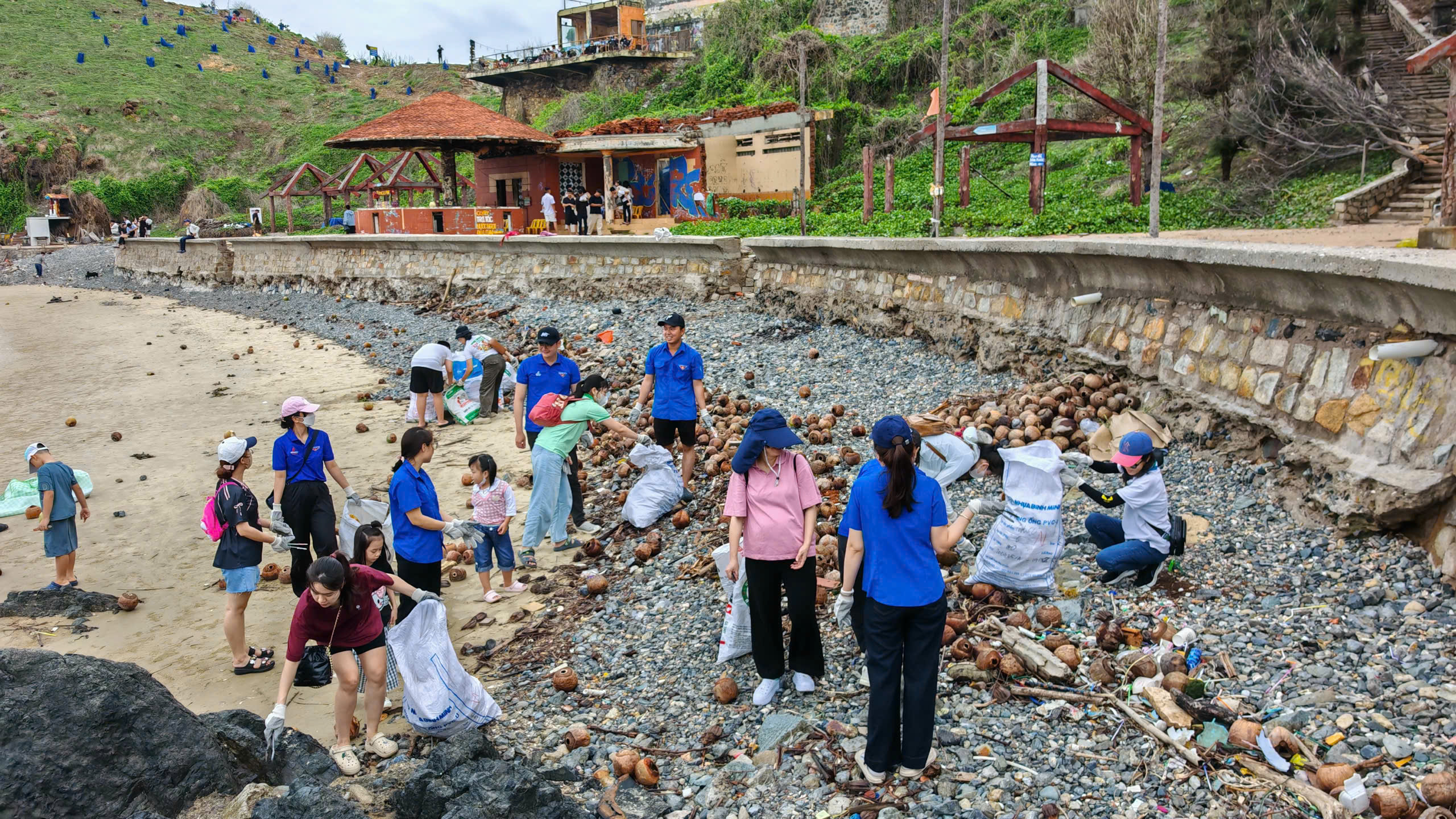 One Small Action – One Blue Ocean 3 PVD Training employees and children cleaning the beach